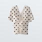 Capa Calma Dots